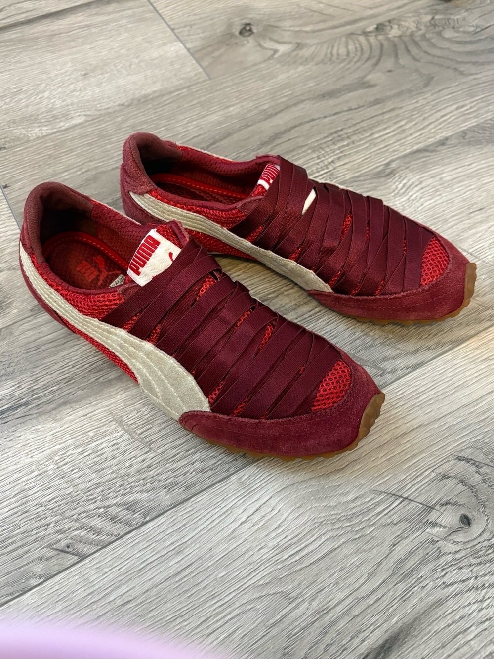 Puma women’s Burgundy Slip-On Sneakers with White Formstrip